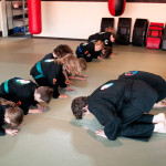 Kids Bowing during Martial Arts Class