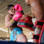 Emma throwing knee strikes in Thailand